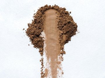 Sift 1–2 tsp of powder